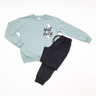 TRAX seasonal jumpsuit in mint color with "WHAT EVER MAKES YOU HAPPY" logo.