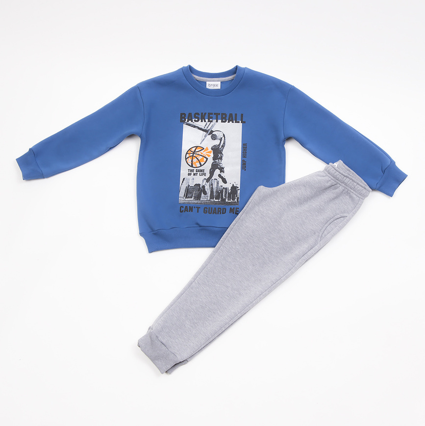 TRAX tracksuit set in blue raff color with "BASKETBALL" print.