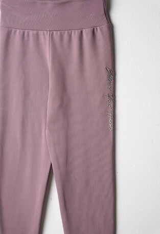 EVITA leggings in purple.