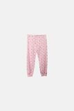 DREAMS Pajamas in pink confetti color with "SLEEPOVER SQUAD" logo.