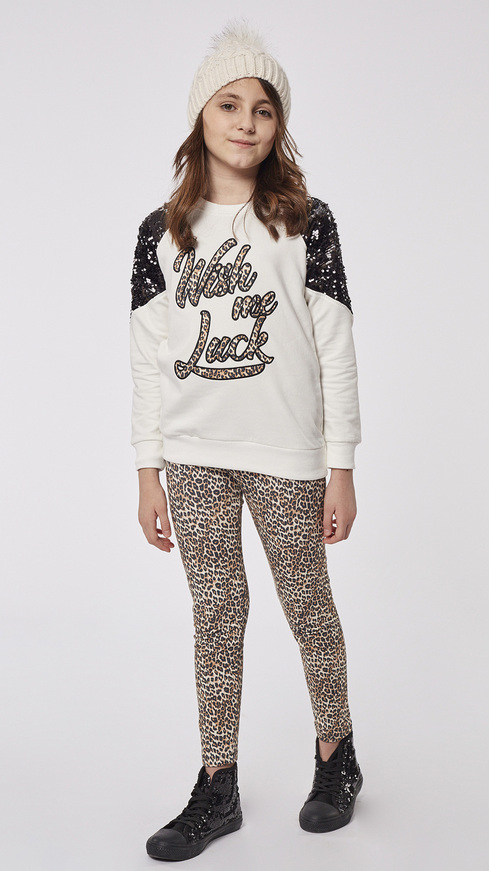 Set of EBITA leggings, ecru sweatshirt and leopard print leggings.