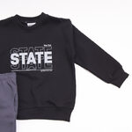 TRAX tracksuit set in black with "STATE" logo.