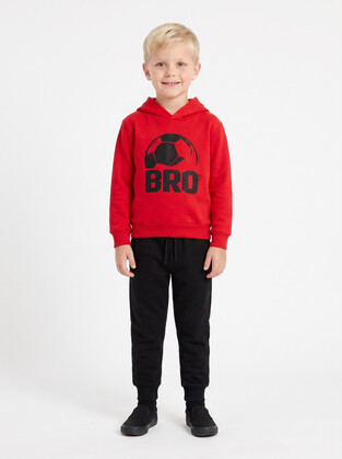 TRAX tracksuit set in red and black.