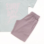 TRAX shorts set in mint color with "SURF DAY" logo.