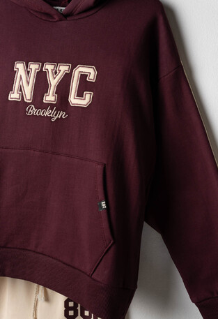 EVITA jumpsuit set in burgundy and ecru.
