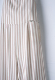 EBITA jumpsuit in ivory and beige colors with striped print.