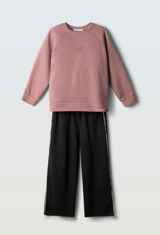 EVITA jumpsuit set in dark pink-black.