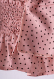 Set of EBITA denim shorts in pink color with polka dot pattern.
