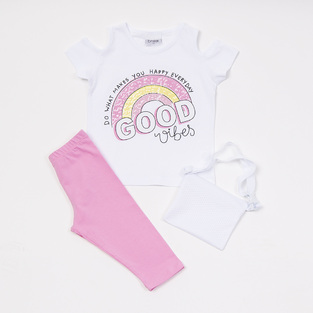 TRAX capri leggings set in white with "GOOD VIBES" logo and purse.