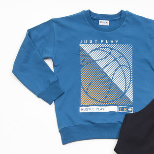 Seasonal set of TRAX tracksuit in petrol color with "JUST PLAY" logo.