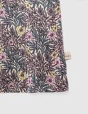 IKKS blouse with floral design and trunks.