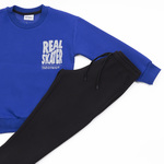 TRAX suit set in roux blue with "REAL SKATER" logo.