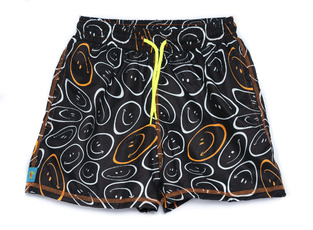 TORTUE bermuda swimsuit in black with all over print of faces.