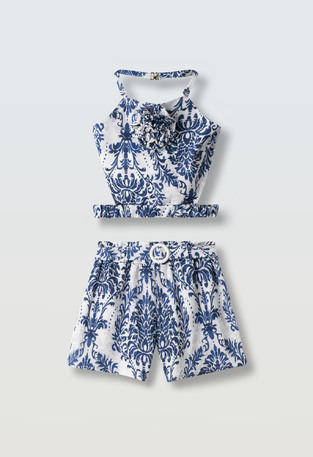 EVITA printed shorts set in ecru and blue.