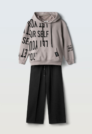 Evita seasonal tracksuit set in gray and black.
