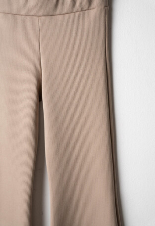 EVITA ribbed leggings in beige color.
