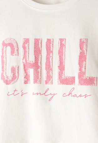 Κοντή μπλούζα ΕΒΙΤΑ σε χρώμα λευκό.