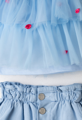EVITA shorts set in light blue.