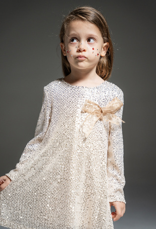 EBITA dress in champagne beige color with sequins.