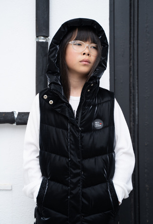 EBITA sleeveless vest with hood in black.