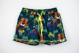 TORTUE bermuda swimsuit with tiger print.