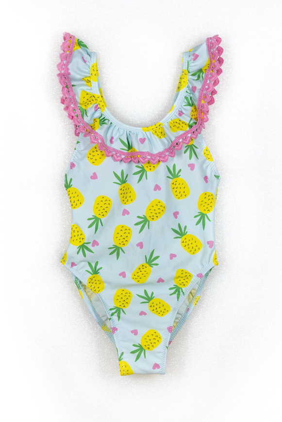 Full body TORTUE swimsuit in verman color with pineapple print.