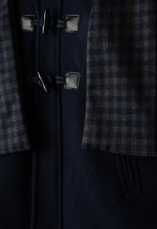 HASHTAG coat in dark blue with built-in hood.