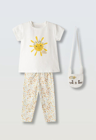 EVITA leggings set in white with matching bag.