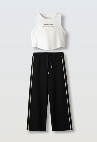 Σετ παντελόνα ΕΒΙΤΑ σε χρώμα λευκό.