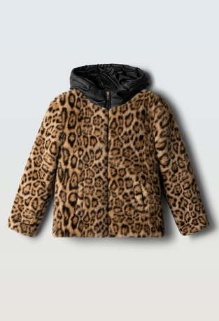 EVITA fur in beige color with animal print.
