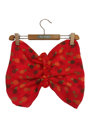 CROOLita pareo in coral color with matching hair tie.