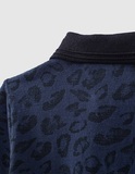 IKKS pique polo shirt in blue color with leopard pattern.