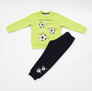 TRAX tracksuit set, green top with ball print and sweatpants.