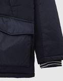 IKKS jacket in dark blue color with built-in hood.