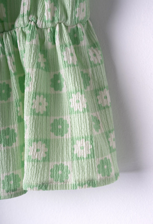 EBITA pants set in mint color with floral design.