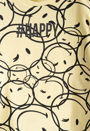 EVITA capri leggings set in yellow with all-over print.