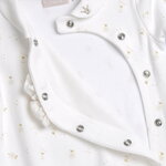 Βαμβακερό φορμάκι CHICCO σε λευκό χρώμα με all over τύπωμα.