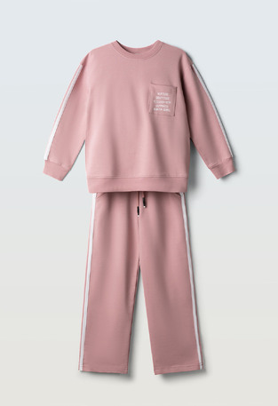 EVITA seasonal tracksuit set in pink.