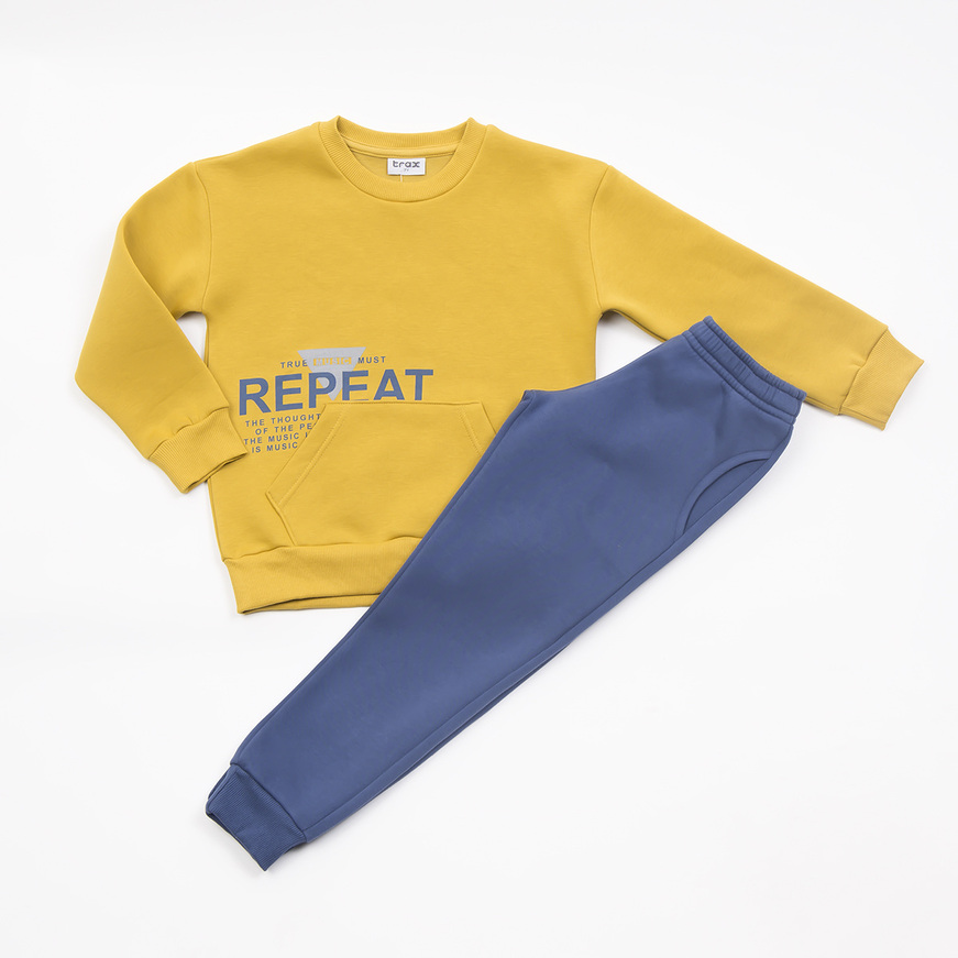 TRAX tracksuit set in mustard color with embossed logo.