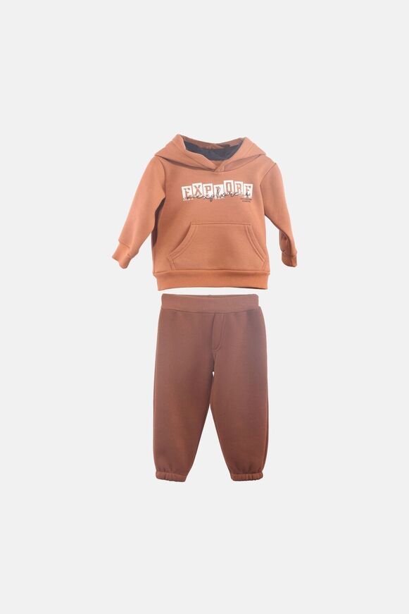 JOYCE tracksuit set in brown with hood and "EXPLORE" logo.