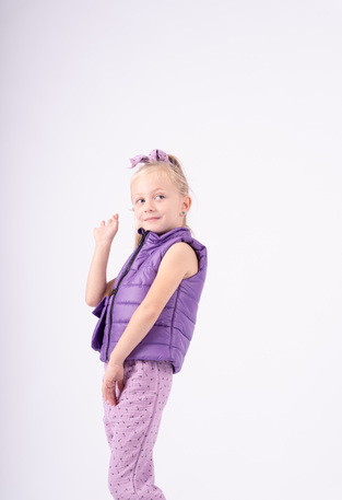 EBITA sleeveless jacket in purple color with a decorative pocket.