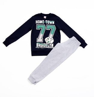 TRAX pajamas in blue with embossed print on the front.