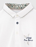 Μπλούζα polo IKKS πικέ σε λευκό χρώμα με κέντημα.