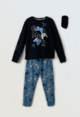 HOMMIES pajama in dark blue with "GAMER" logo embossing and matching sleep mask.
