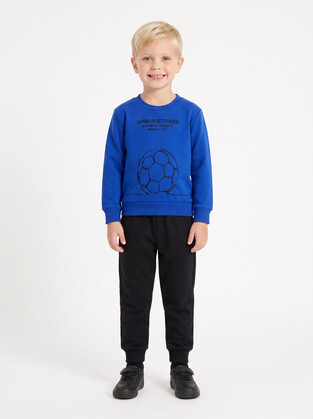 TRAX tracksuit set in royal blue and black.