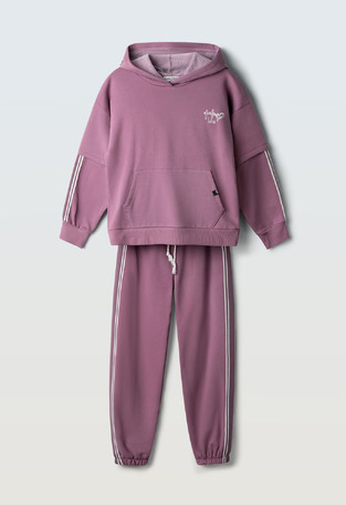 EVITA jumpsuit set in purple.