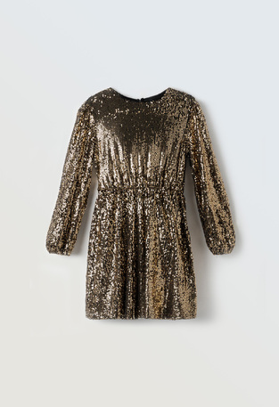 EBITA dress in gold color with sequins.