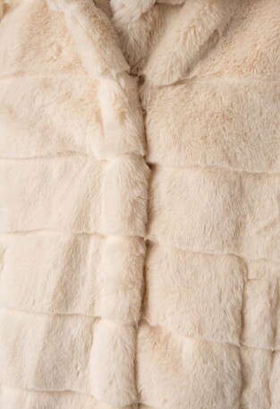 EBITA fur coat in ecru-beige color.