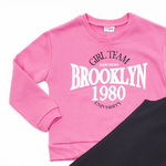 TRAX bodysuit set in pink bubble color with embossed print.