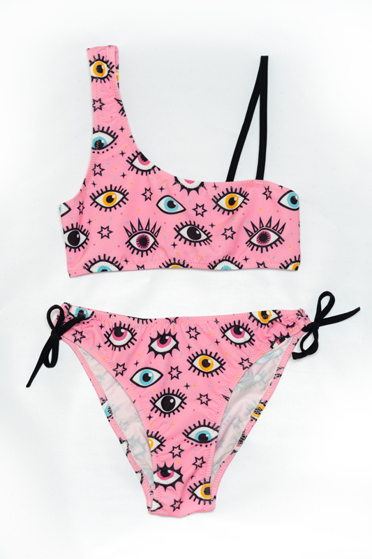 TORTUE pink bikini swimsuit with eye print.